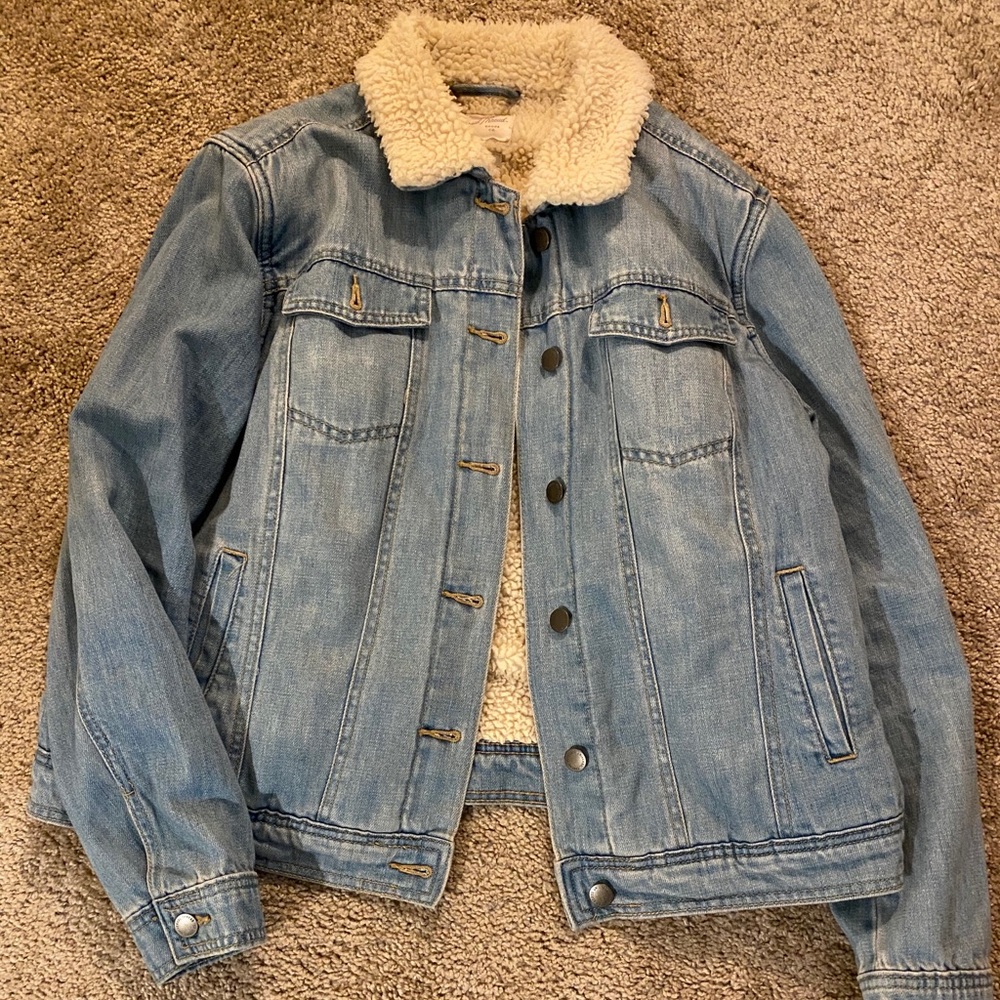 Denim jacket with sherpa  inside.